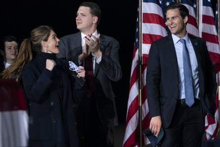Hope Hicks, William Russell, and John McCanty, the president's advisor, cheers as President Donald Trump speaks during a campaign rally at Harrisburg International Airport, Saturday, September 26, 2020, in Middletown, Pennsylvania.  Special Assistant to the President and the White House Journey Director William Russell, Center, and Director of the White House Office of Personnel John McCanty, witness.  (AP photo / Evan Vucci)