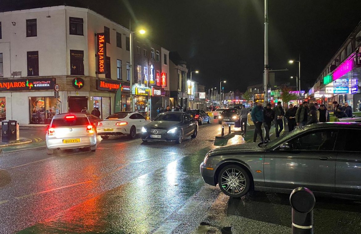 Bars and restaurants on Manchester's so-called Curry Mile were full on Friday night