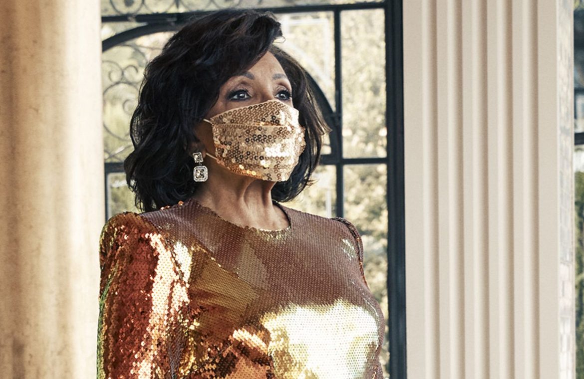 EMBARGOED TO 0001 FRIDAY OCTOBER 16 Undated handout photo of Dame Shirley Bassey, 83, wearing a matching face mask and sequined gold gown during a photo shoot in Italy for her forthcoming new album 'Owe It All To You'.