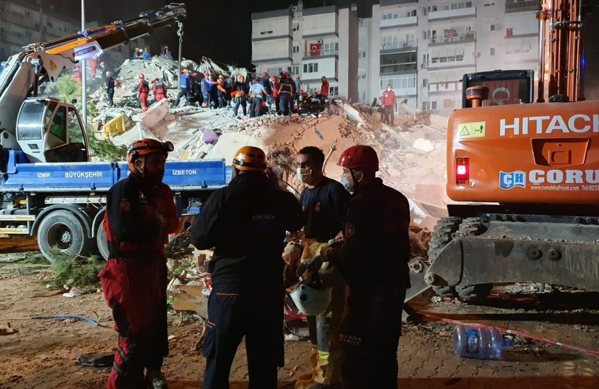 Rescue teams search through the rubble in Bayrakli, Izmir