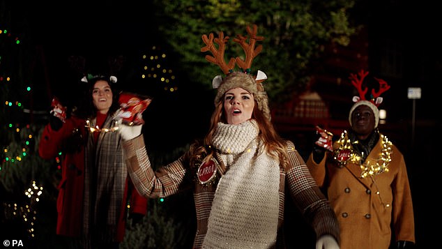 LadBaby, real name Mark Hoyle, has filed a public application to appear in the campaign after being horrified at the exact way Mariah Carey ingested potato chips in last year's ad, when she introduced her festive song All I Want For Christmas Is You.  Pictured the singers in the advertisement