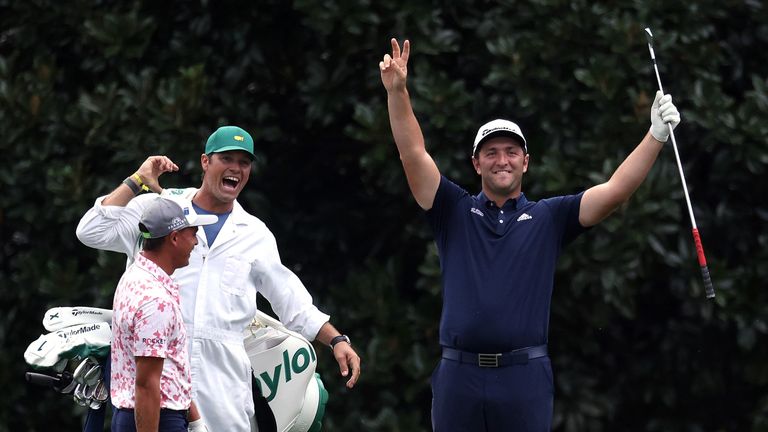 Augusta, Georgia - November 10: Spaniard John Ram celebrates with boxer Adam Hayes and Ricky Fowler of the United States after skipping a hole in one day 16 during a pre-Masters training round at Augusta National Golf Club on November 10, 2020 in Augusta, Georgia.  (Photo by Rob Carr / Getty Images)