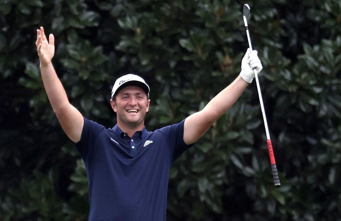 AUGUSTA, GEORGIA - NOVEMBER 10: Jon Rahm of Spain celebrates skipping in for a hole in one on the 16th during a practice round prior to the Masters at Augusta National Golf Club on November 10, 2020 in Augusta, Georgia. (Photo by Rob Carr/Getty Images)
