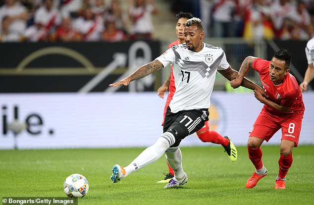 Jerome Boateng's international career has also been interrupted (left) by Joachim Law