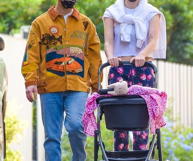 Joe Jonas and Sophie Turner spend some quality time together while taking their daughter for a walk