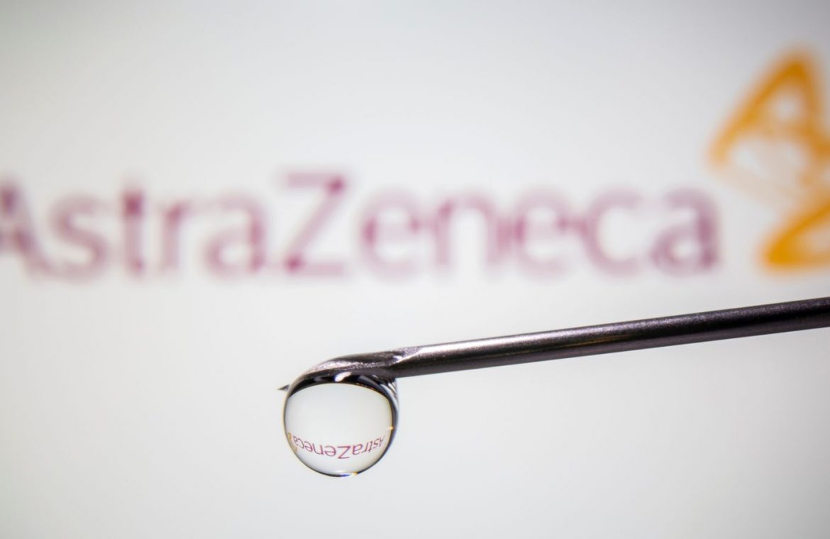 AstraZeneca's logo is reflected in a drop on a syringe needle in this illustration taken November 9, 2020.