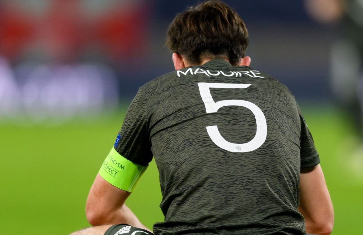 Harry Maguire looks dejected after Manchester United's defeat to RB Leipzig in the Champions League