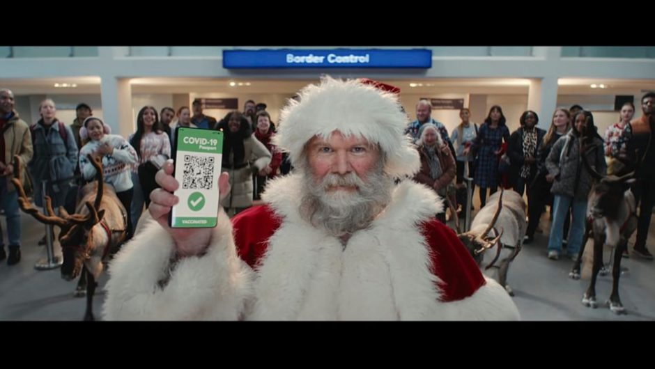 Christmas ad.  Santa with covid lane