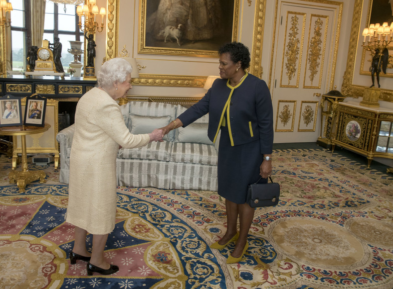A private audience of Mason with Elizabeth II at Buckingham Palace in 2018. 