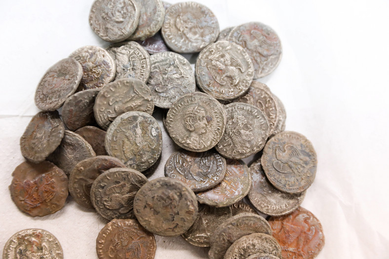 Bronze and silver coins, caught from the shipwreck at a depth of approximately 4 meters
