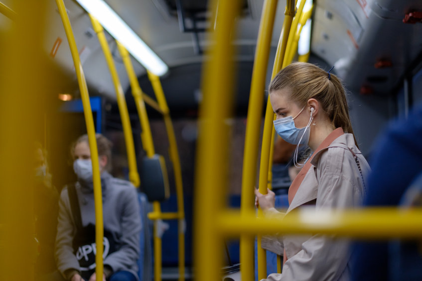 How will the space on the bus affect the likelihood of infection with SARS-CoV-2?