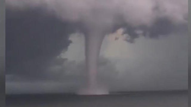 Impressive water column in front of Florida eyewitnesses filming a landscape